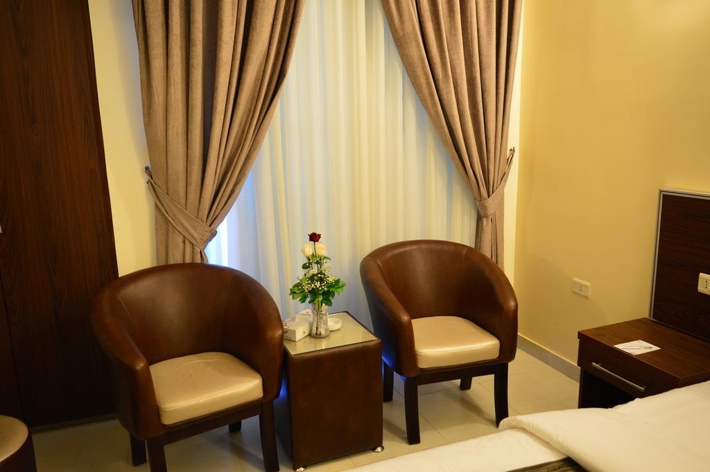 Ream Hotel Amman Cameră foto