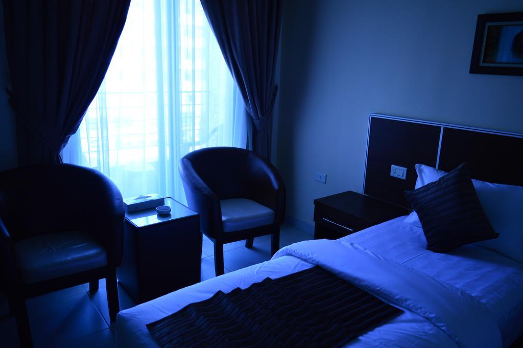 Ream Hotel Amman Cameră foto