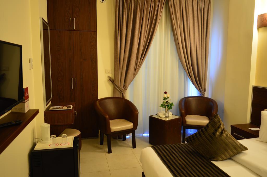 Ream Hotel Amman Cameră foto